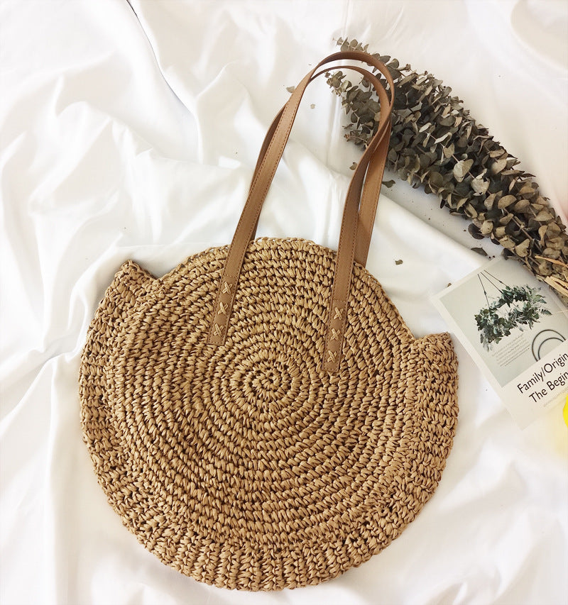 Bolso bandolera de playa redondo de paja tejida