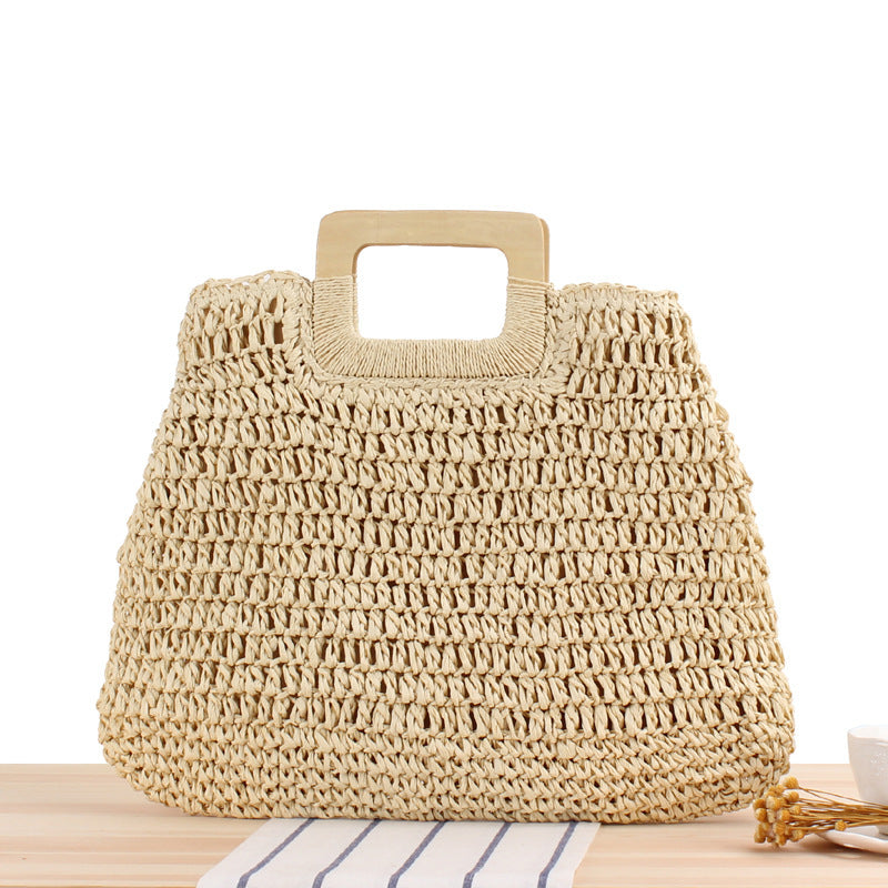 Bolso bandolera de playa redondo de paja tejida
