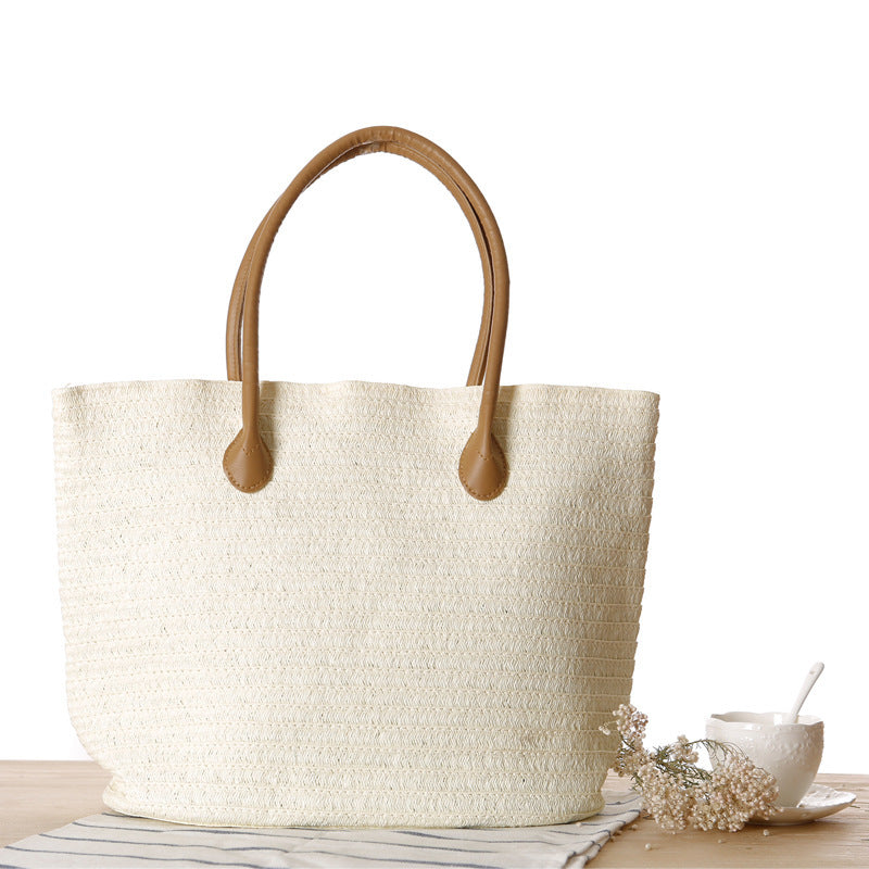 Bolso bandolera de playa redondo de paja tejida