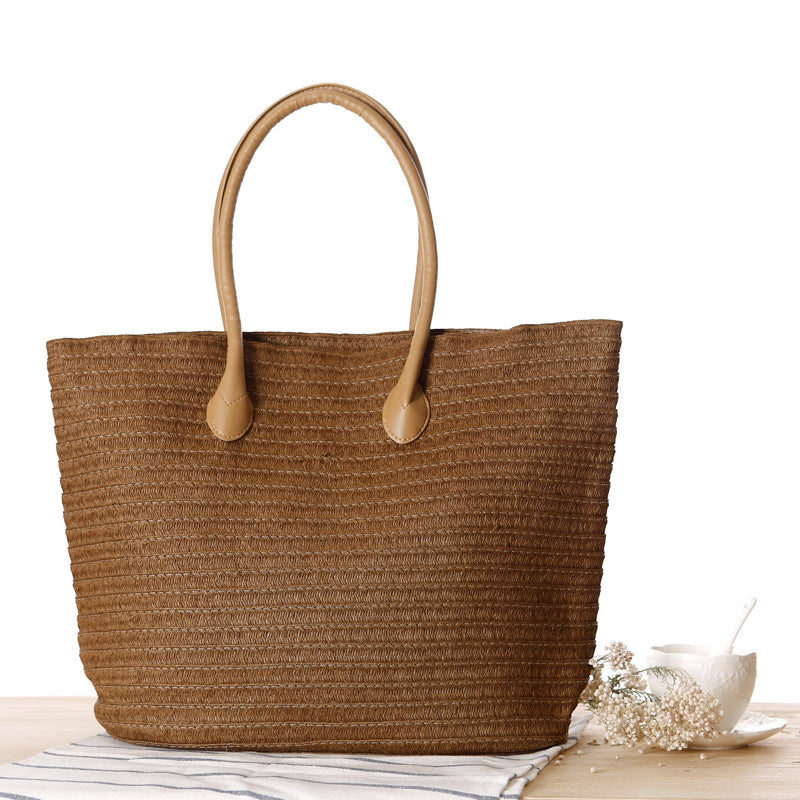Bolso bandolera de playa redondo de paja tejida
