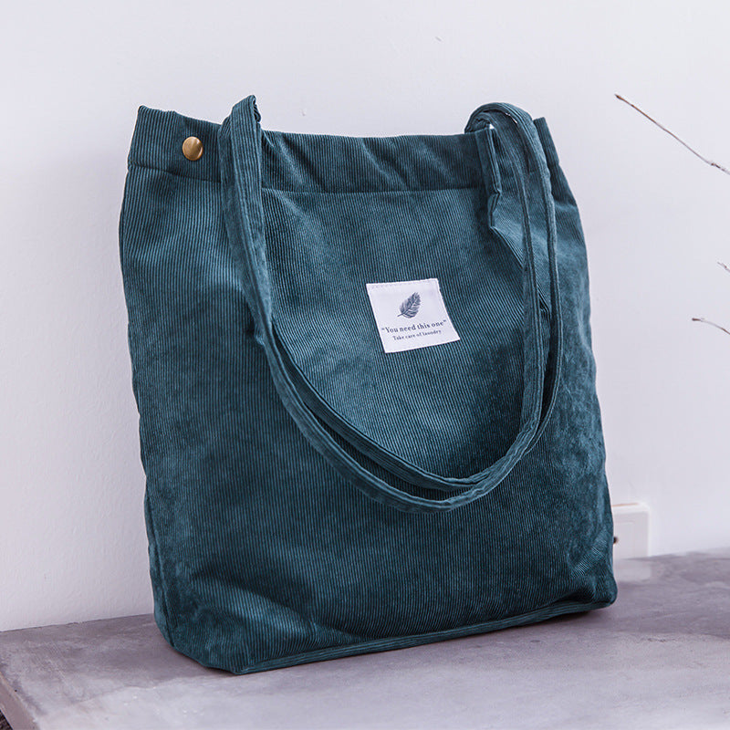 Bolso de mano de pana