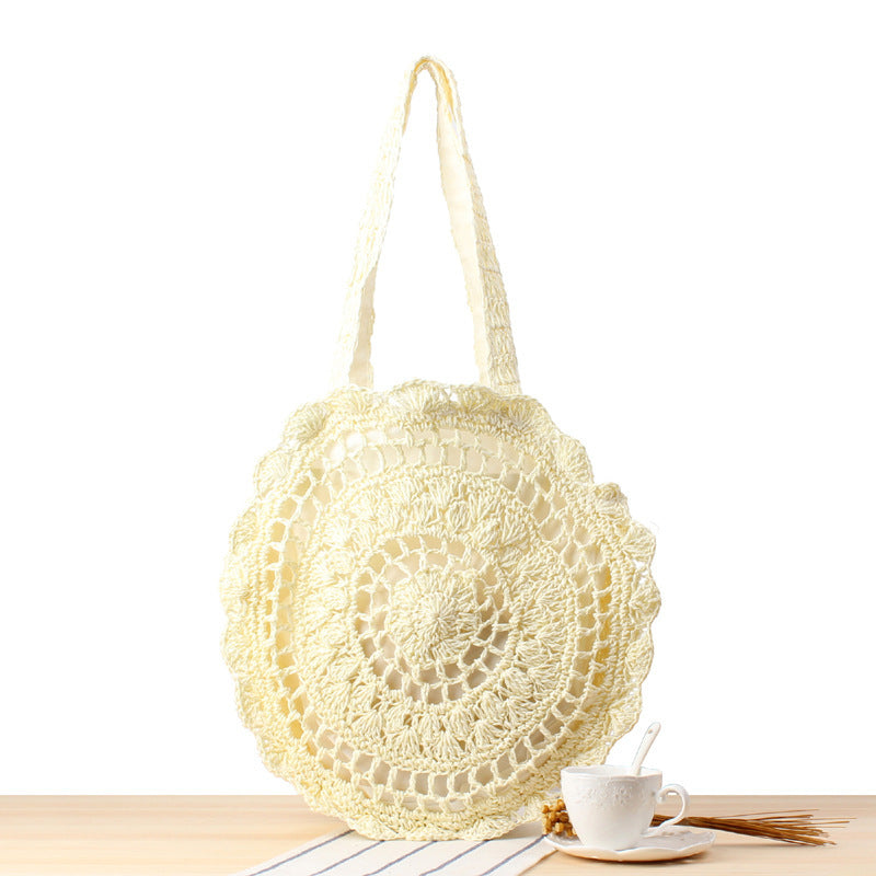 Bolso bandolera de playa redondo de paja tejida