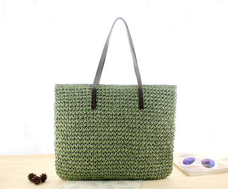 Bolso bandolera de playa redondo de paja tejida