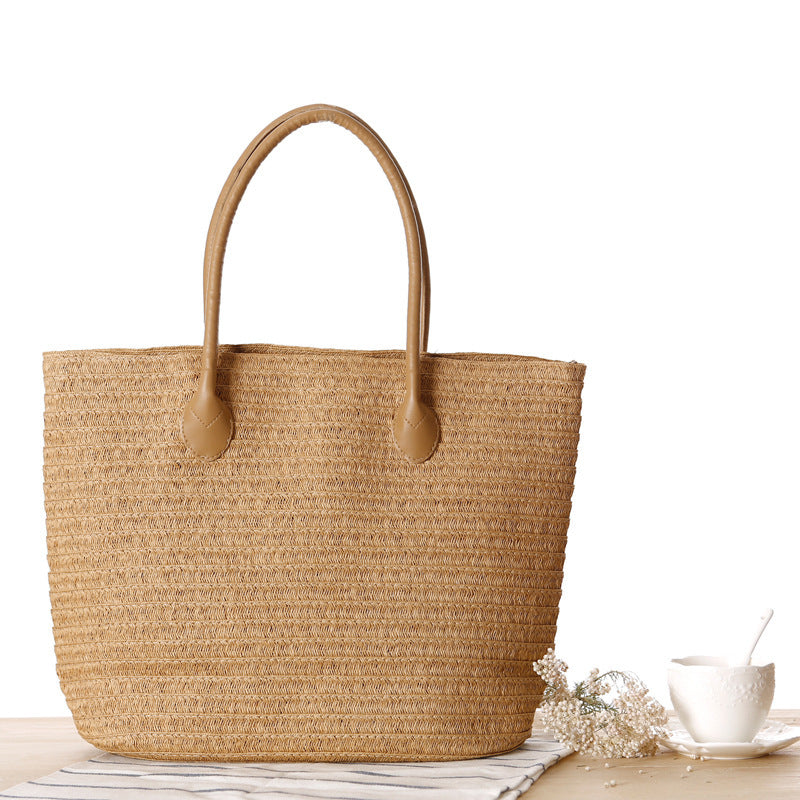 Bolso bandolera de playa redondo de paja tejida