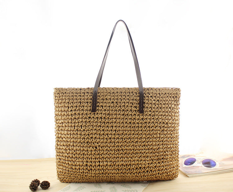 Bolso bandolera de playa redondo de paja tejida