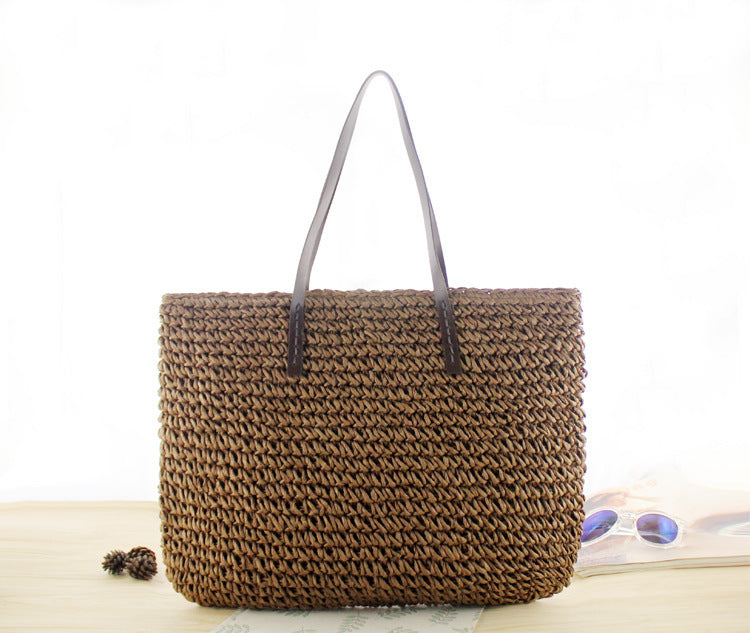 Bolso bandolera de playa redondo de paja tejida