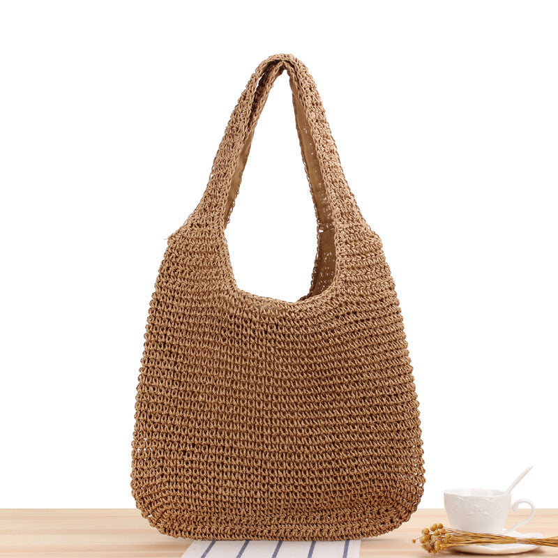 Bolso bandolera de playa redondo de paja tejida