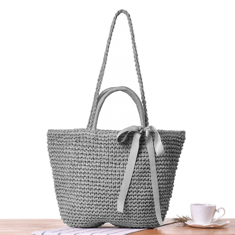 Bolso bandolera de playa redondo de paja tejida