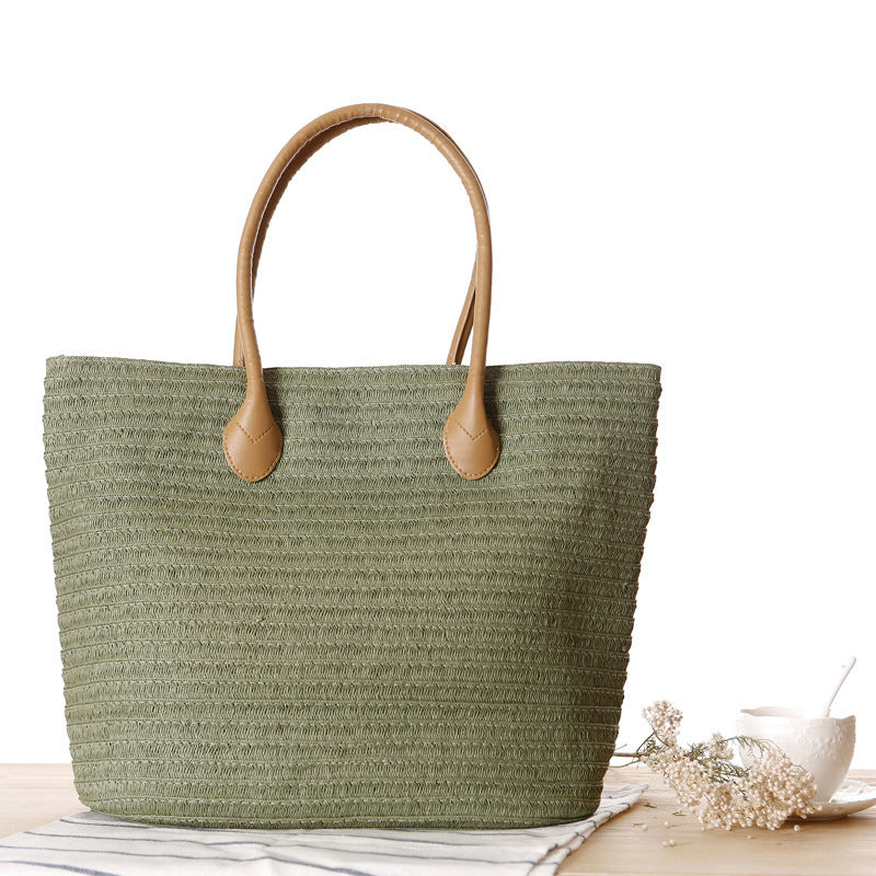 Bolso bandolera de playa redondo de paja tejida