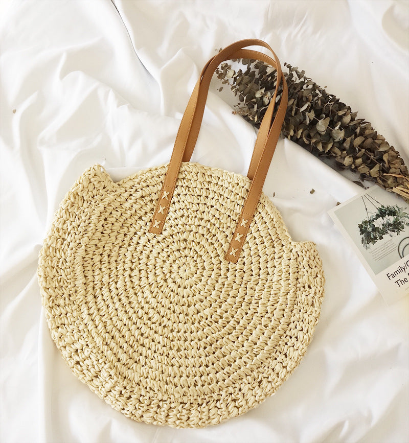 Bolso bandolera de playa redondo de paja tejida