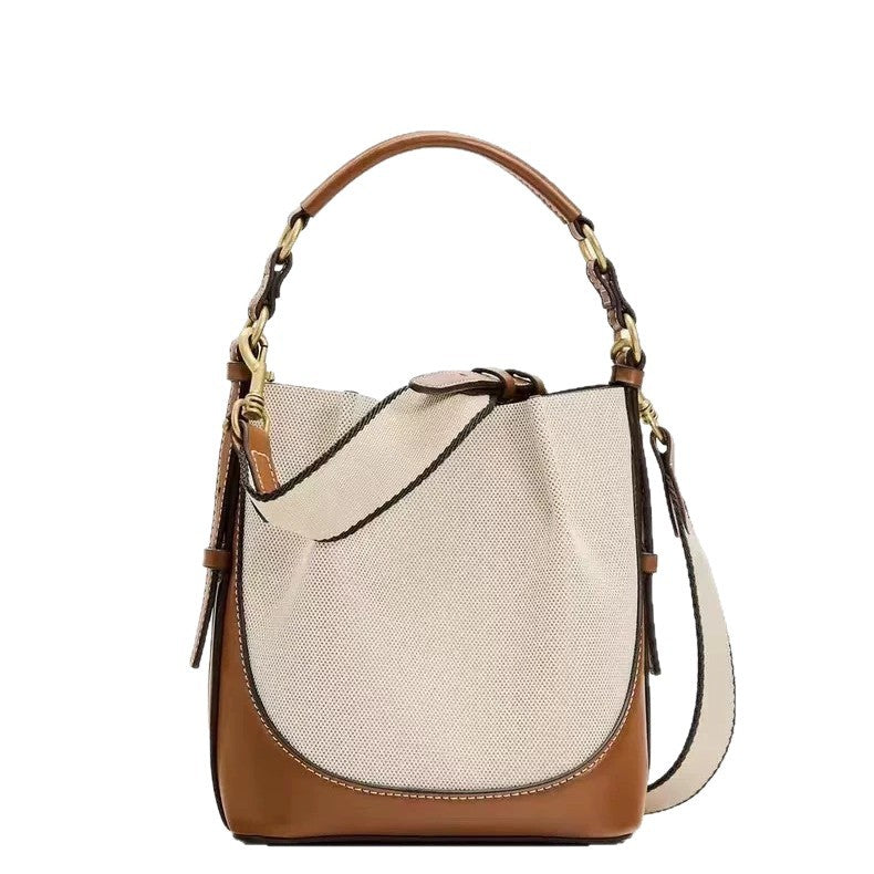 Bolso tipo cubo de lona con cordón en contraste