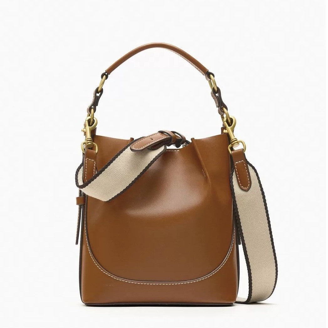 Bolso tipo cubo de lona con cordón en contraste