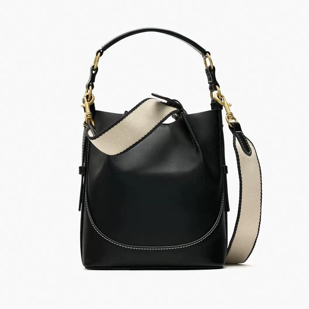 Bolso tipo cubo de lona con cordón en contraste