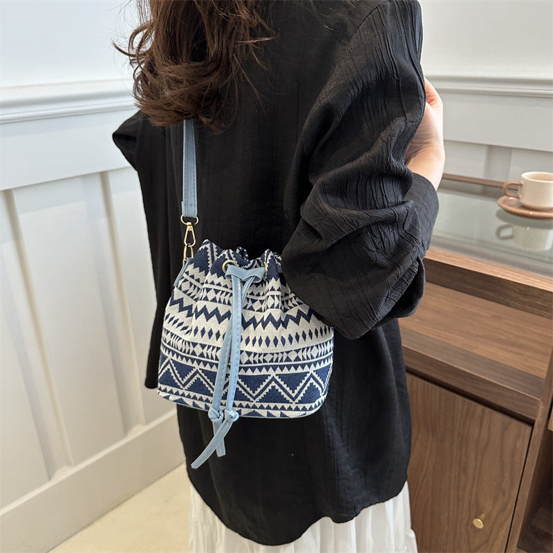 Retro Hand Holding Bucket Bag
