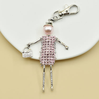 Llavero para mujer hecho a mano con colgante de bolso de dibujos animados