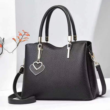 Bolso bandolera con estampado de Litchi Bay