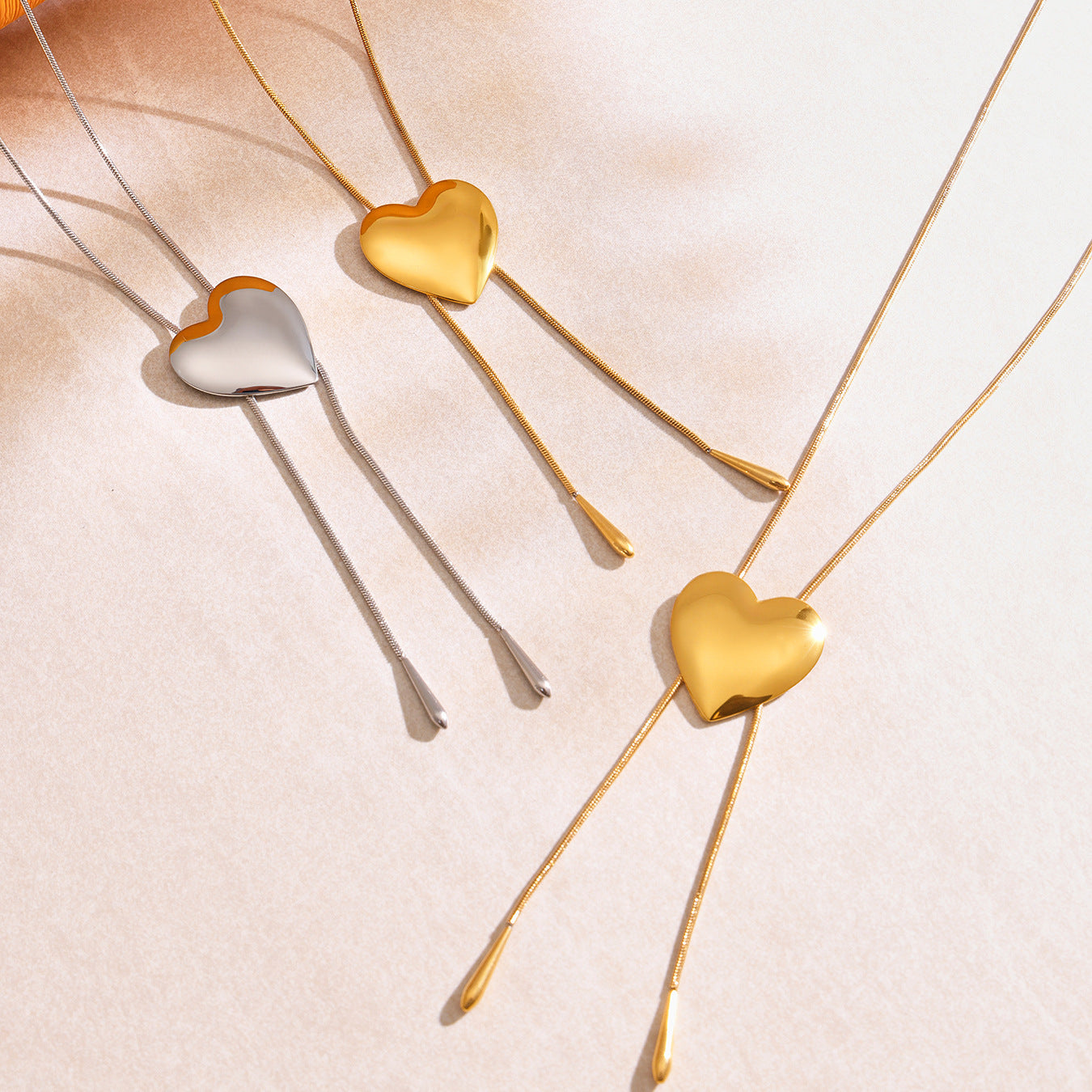 Stainless Steel Glossy Heart Pull-out Long Necklace