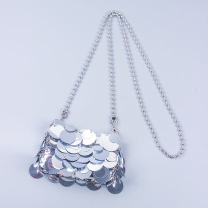 Bolso de hombro con cadena tejida y lentejuelas