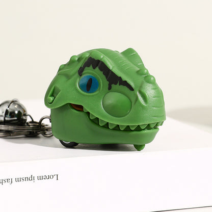 Llavero con colgante de dinosaurio para coche con forma de dedo mordedor creativo