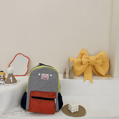 Mochila de lona ligera y sencilla para niños y niñas con protección para la columna vertebral.