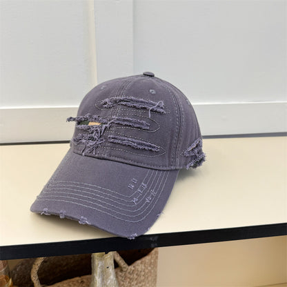 Sonnenhut machen alte zerrissene Softtop-Baseballkappe