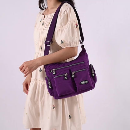 Bolsos cruzados impermeables con múltiples bolsillos