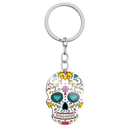 Llavero de acero inoxidable con estampado a color de calavera del Día de los Muertos