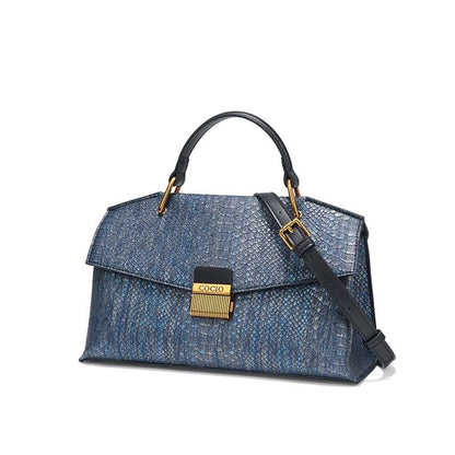 Bolsos con textura de serpiente azul