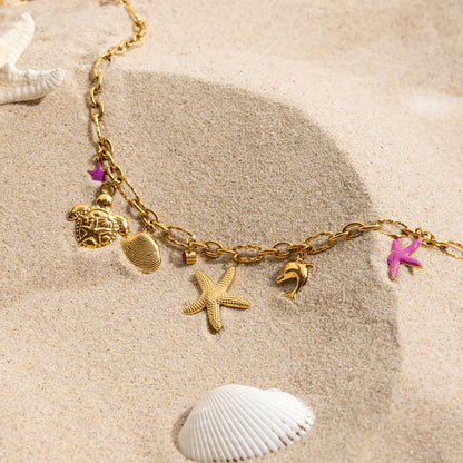 Collar de estrella de cinco puntas con caparazón de delfín y tortuga