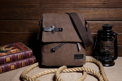En nombre de una fábrica directa de lona casual, bolsos de hombro para hombres al aire libre y resistentes al viento al por mayor 