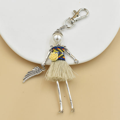 Llavero para mujer hecho a mano con colgante de bolso de dibujos animados