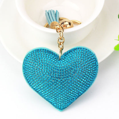 Llavero de cuero con forma de corazón de melocotón y diamantes de imitación, colgante para bolso con borlas de amor