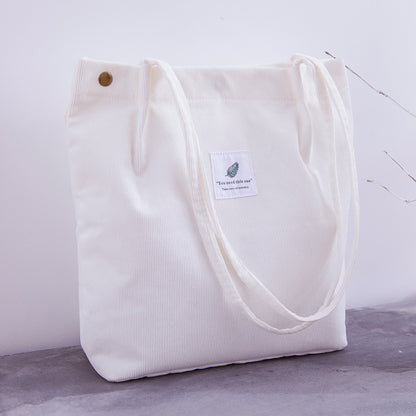 Bolso de mano de pana