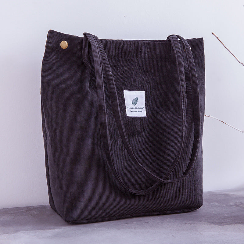 Bolso de mano de pana