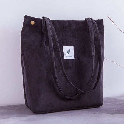 Bolso de mano de pana
