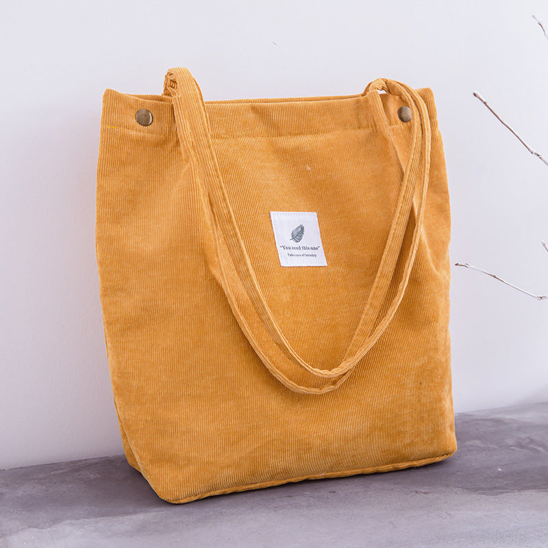 Bolso de mano de pana