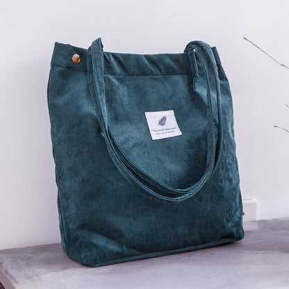 Bolso de mano de pana