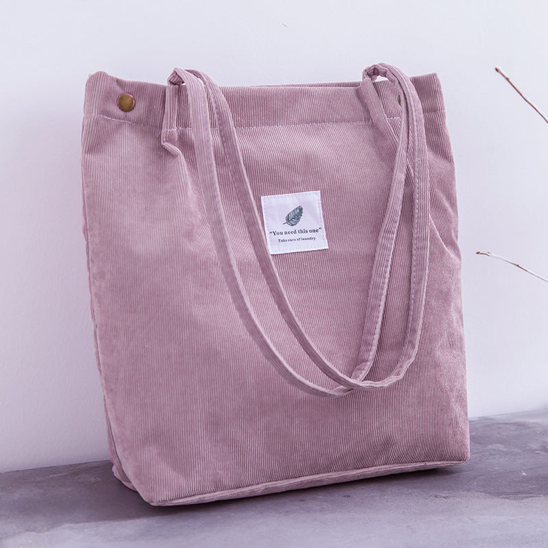 Bolso de mano de pana