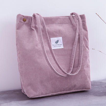Bolso de mano de pana