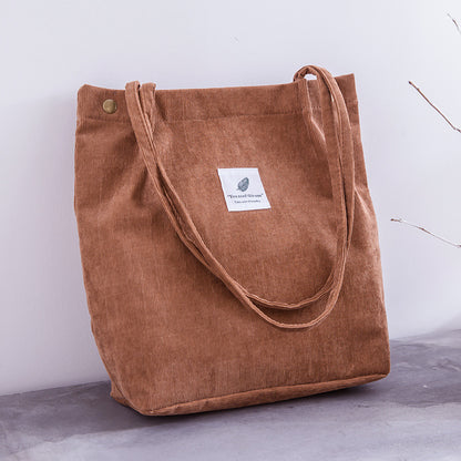 Bolso de mano de pana