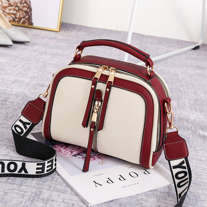 Kleine quadratische Taschen mit breiter Schulter