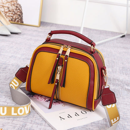 Kleine quadratische Taschen mit breiter Schulter