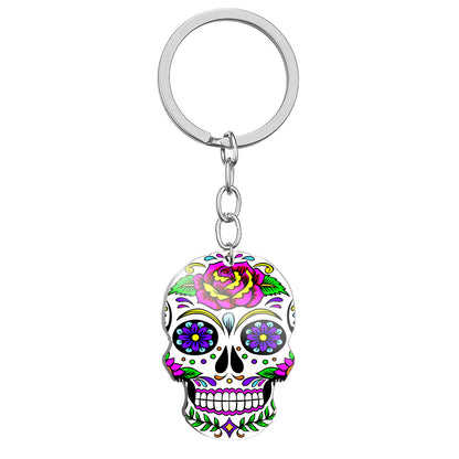 Llavero de acero inoxidable con estampado a color de calavera del Día de los Muertos