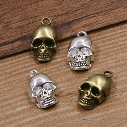 10 colgantes de cabeza de fantasma de calavera de 3 colores para Halloween