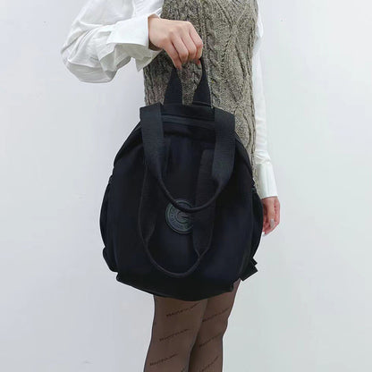 Mochila multifuncional redonda negra