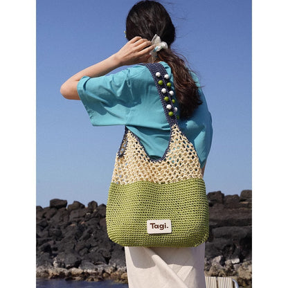 Bolso de viaje hecho a mano con cuentas de madera y cuerda