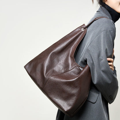 Bolso de mano de piel curtida vegetal de primera calidad