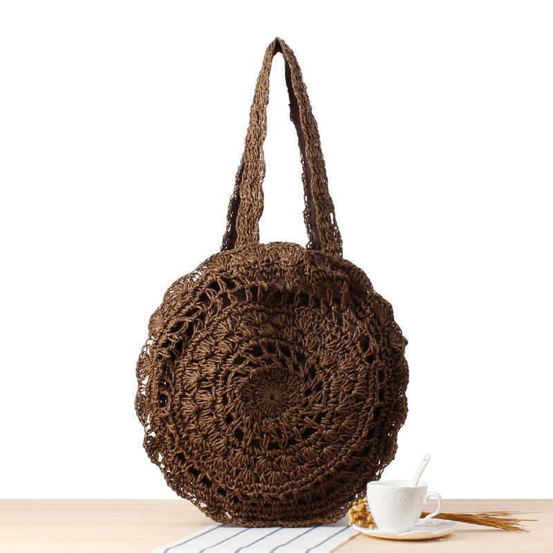 Bolso bandolera de playa redondo de paja tejida