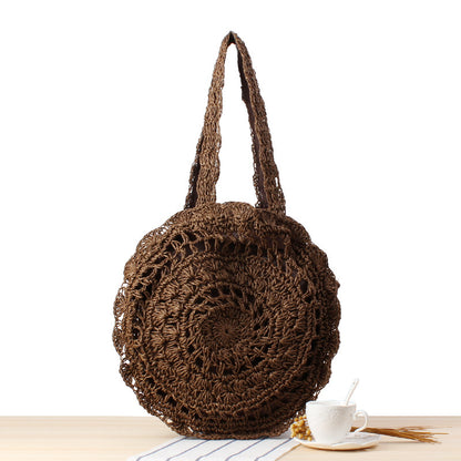 Bolso bandolera de playa redondo de paja tejida
