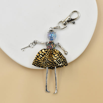 Llavero para mujer hecho a mano con colgante de bolso de dibujos animados